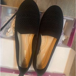 Black flats/ woven like material